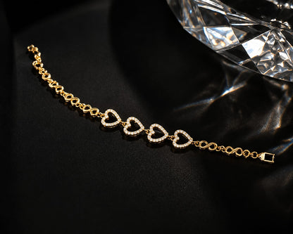 Four Heart CZ Gold Bracelet